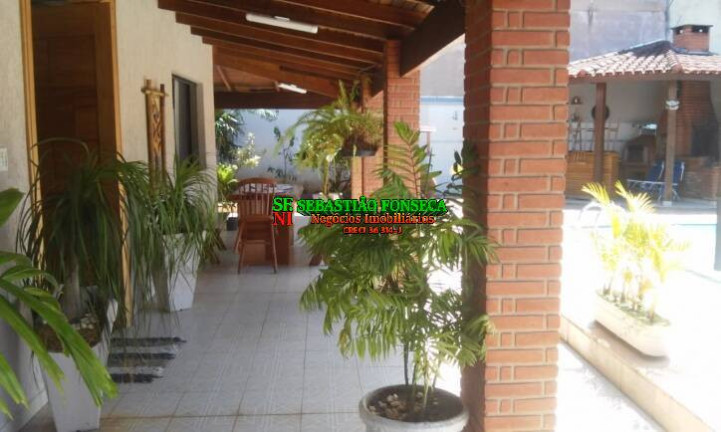 Imagem Casa com 4 Quartos à Venda, 400 m² em Caraguatatuba