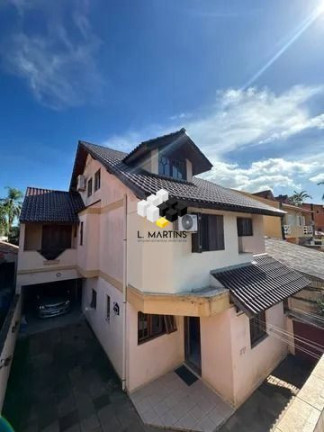 Imagem Casa com 3 Quartos à Venda, 320 m² em Rubem Berta - Porto Alegre