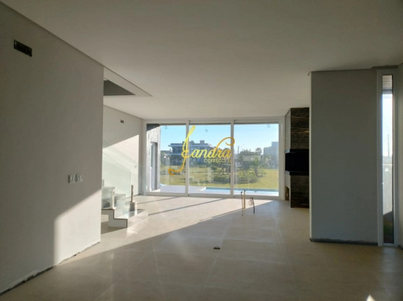 Imagem Casa de Condomínio com 4 Quartos à Venda, 247 m² em Centro - Xangri-la