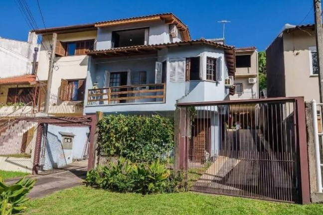 Imagem Casa com 3 Quartos à Venda, 396 m² em Partenon - Porto Alegre