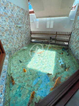 Imagem Sobrado com 4 Quartos à Venda, 460 m² em Indaiá - Caraguatatuba