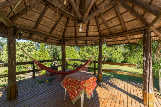 Imagem Sobrado com 3 Quartos à Venda, 16.384 m² em Campo Novo - Porto Alegre