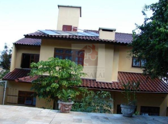 Imagem Casa com 4 Quartos à Venda, 460 m² em Cristal - Porto Alegre Imagem Casa com 4 Quartos à Venda, 460 m² em Cristal - Porto Alegre