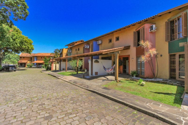 Imagem Casa com 4 Quartos à Venda, 117 m² em Cavalhada - Porto Alegre