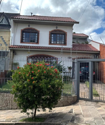 Imagem Casa com 3 Quartos à Venda, 244 m² em Cavalhada - Porto Alegre
