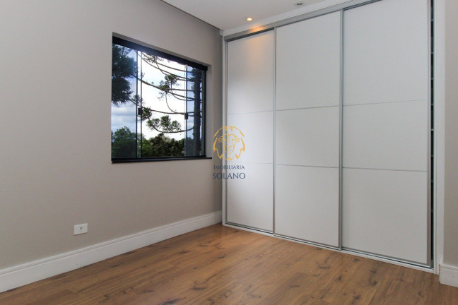 Imagem Casa de Condomínio com 3 Quartos à Venda, 360 m² em Bacacheri - Curitiba