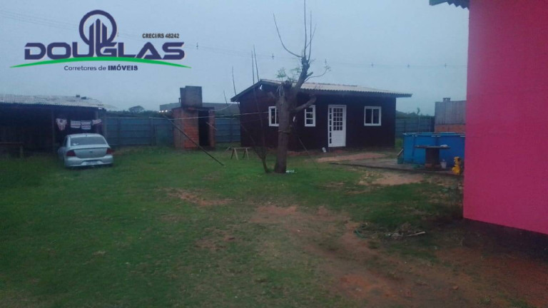 Imagem Casa com 4 Quartos à Venda,  em Viamão