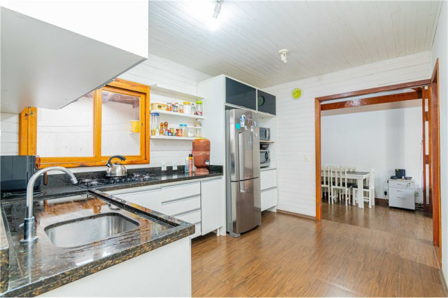 Imagem Casa com 4 Quartos à Venda,  em Sarandi - Porto Alegre