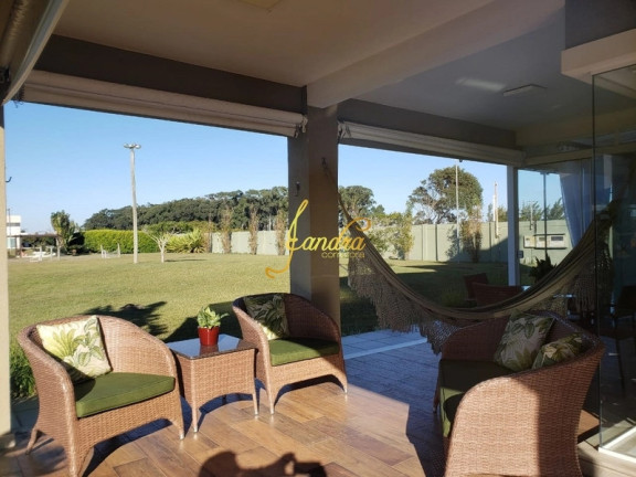 Imagem Casa de Condomínio com 4 Quartos à Venda, 350 m² em Remanso - Xangri-la