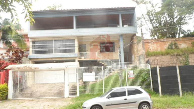 Imagem Casa com 5 Quartos à Venda, 287 m² em Santa Tereza - Porto Alegre Imagem Casa com 5 Quartos à Venda, 287 m² em Santa Tereza - Porto Alegre