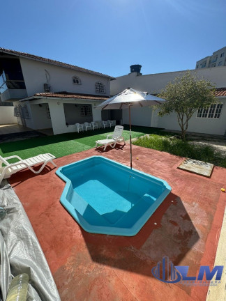 Imagem Casa com 4 Quartos à Venda, 210 m² em Kubitschek - Guarapari
