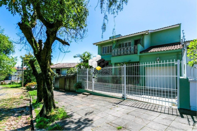 Imagem Casa com 4 Quartos à Venda, 300 m² em Chácara Das Pedras - Porto Alegre Imagem Casa com 4 Quartos à Venda, 300 m² em Chácara Das Pedras - Porto Alegre