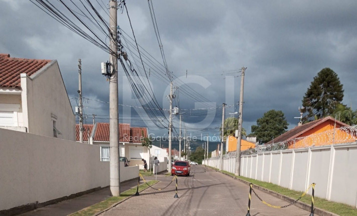 Imagem Casa de Condomínio com 2 Quartos à Venda, 56 m² em Restinga - Porto Alegre