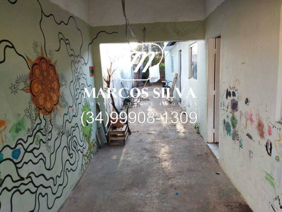 Imagem Casa com 4 Quartos à Venda, 300 m² em Segismundo Pereira - Uberlândia