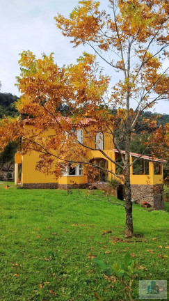 Imagem Chácara com 4 Quartos à Venda, 245 m²