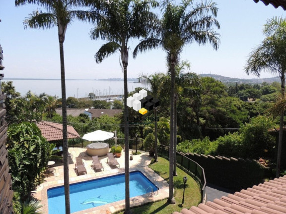 Imagem Casa com 4 Quartos à Venda, 430 m² em Vila Assunção - Porto Alegre