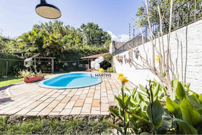 Imagem Casa com 3 Quartos à Venda, 235 m² em Guarujá - Porto Alegre Imagem Casa com 3 Quartos à Venda, 235 m² em Guarujá - Porto Alegre