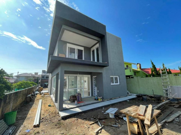 Imagem Sobrado com 3 Quartos à Venda, 217 m² em Village - Capao Da Canoa