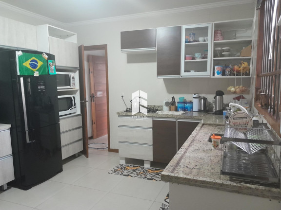 Imagem Casa com 3 Quartos à Venda, 220 m² em Juscelino Kubitschek - Santa Maria