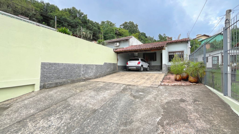 Imagem Casa com 3 Quartos à Venda, 156 m² em Vila Nova - Porto Alegre