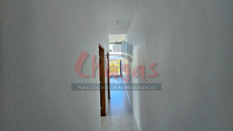 Imagem Casa com 2 Quartos à Venda, 130 m² em Golfinhos - Caraguatatuba