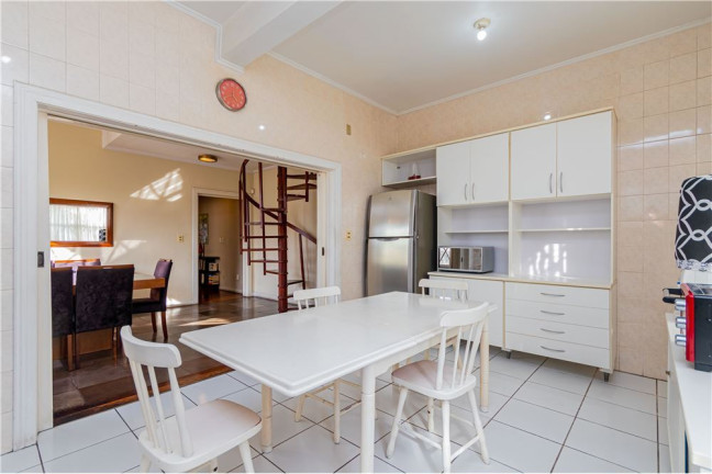 Imagem Casa com 4 Quartos à Venda, 360 m² em Menino Deus - Porto Alegre