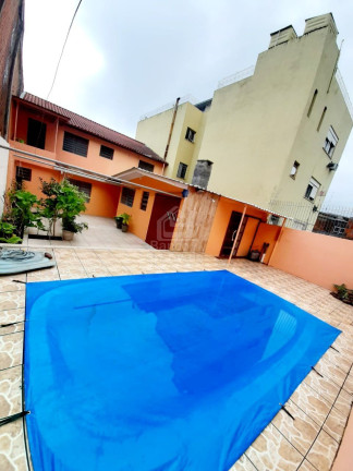 Imagem Casa com 4 Quartos à Venda, 248 m² em Itararé - Santa Maria Imagem Casa com 4 Quartos à Venda, 248 m² em Itararé - Santa Maria