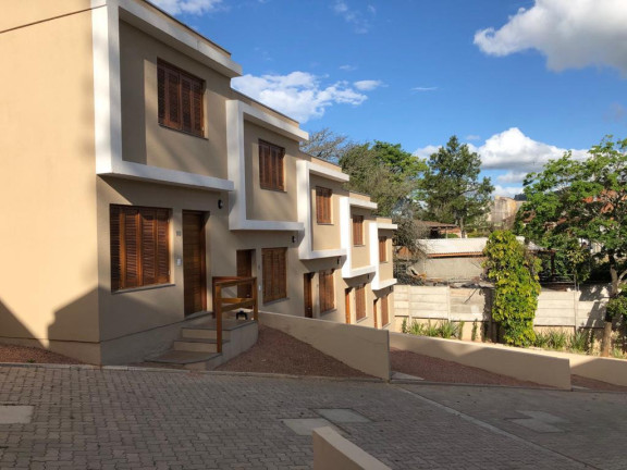 Imagem Casa de Condomínio com 2 Quartos à Venda, 106 m² em Teresópolis - Porto Alegre