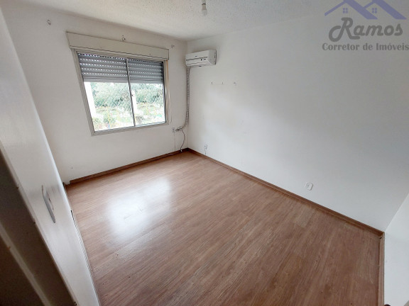 Imagem Imóvel com 2 Quartos à Venda, 50 m² em Vila Nova - Porto Alegre