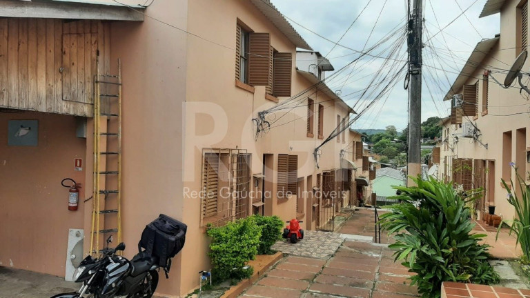 Imagem Casa de Condomínio com 1 Quarto à Venda, 61 m² em Vila São José - Porto Alegre