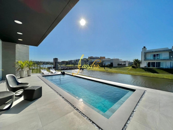 Imagem Casa de Condomínio com 4 Quartos à Venda, 320 m² em Capão Ilhas Resort - Capão Da Canoa