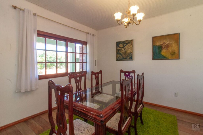 Imagem Casa com 3 Quartos à Venda, 216 m² em Vila Nova - Porto Alegre