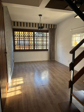 Imagem Casa com 3 Quartos à Venda, 166 m² em Medianeira - Porto Alegre