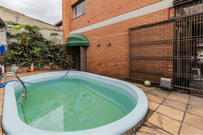Imagem Casa com 3 Quartos à Venda, 380 m² em Partenon - Porto Alegre Imagem Casa com 3 Quartos à Venda, 380 m² em Partenon - Porto Alegre