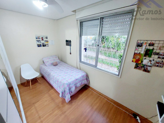 Imagem Imóvel com 3 Quartos à Venda, 62 m² em Vila Nova - Porto Alegre