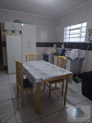 Imagem Sobrado com 5 Quartos à Venda, 210 m²