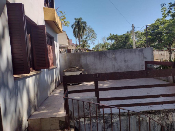 Imagem Casa com 4 Quartos à Venda, 238 m² em Cristal - Porto Alegre