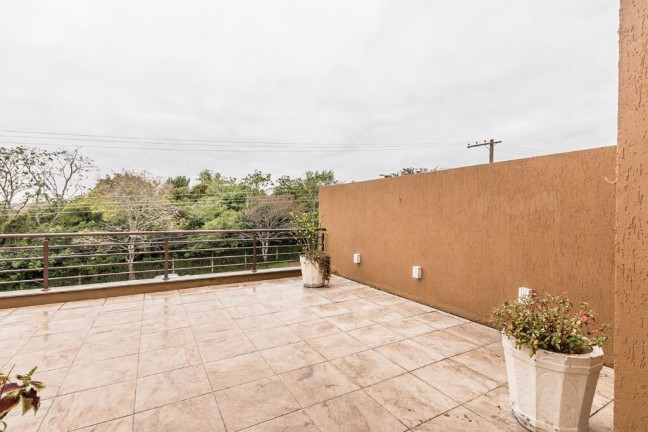 Imagem Casa de Condomínio com 3 Quartos à Venda, 180 m² em Mário Quintana - Porto Alegre