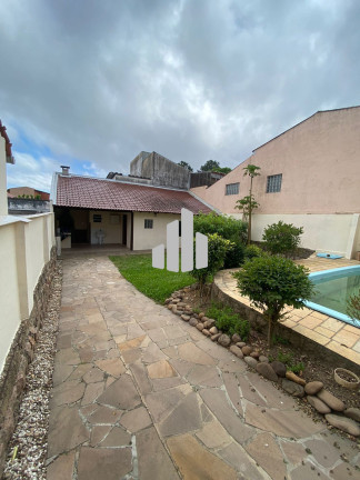Imagem Casa com 3 Quartos à Venda, 260 m² em Guarujá - Porto Alegre