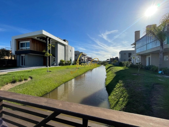 Imagem Casa de Condomínio com 4 Quartos à Venda, 239 m² em Centro - Xangri-la