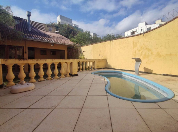 Imagem Casa com 2 Quartos à Venda, 194 m² em Jardim Botânico - Porto Alegre