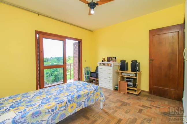 Imagem Casa com 3 Quartos à Venda, 299 m² em Glória - Porto Alegre