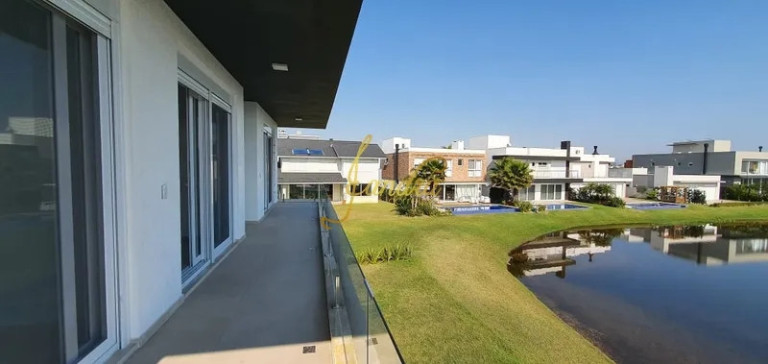 Imagem Casa de Condomínio com 5 Quartos à Venda, 301 m² em Centro - Xangri-la