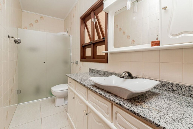 Imagem Casa com 3 Quartos à Venda, 270 m² em Partenon - Porto Alegre