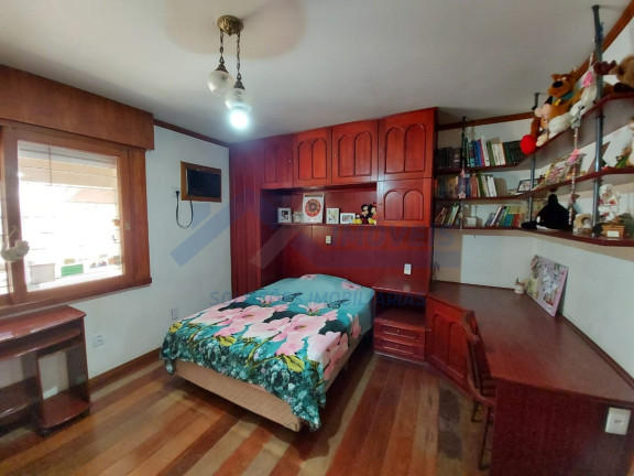 Imagem Sobrado com 5 Quartos à Venda, 380 m² em Jardim Lindóia - Porto Alegre