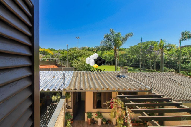 Imagem Casa com 3 Quartos à Venda, 198 m² em Cavalhada - Porto Alegre Imagem Casa com 3 Quartos à Venda, 198 m² em Cavalhada - Porto Alegre