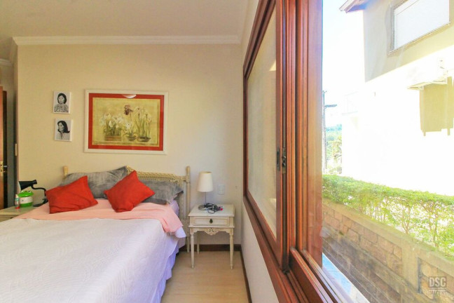 Imagem Casa de Condomínio com 3 Quartos à Venda, 389 m² em Vila Nova - Porto Alegre