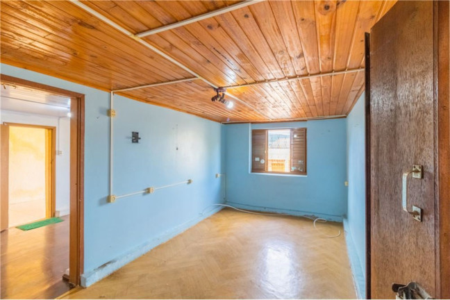 Imagem Casa com 5 Quartos à Venda,  em Partenon - Porto Alegre
