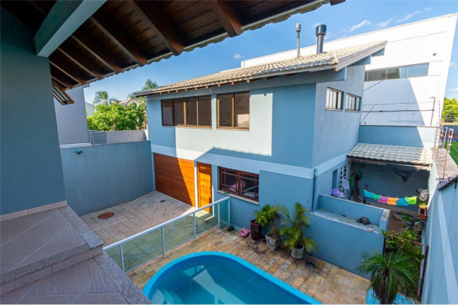 Imagem Casa com 4 Quartos à Venda,  em Moinhos De Vento - Canoas