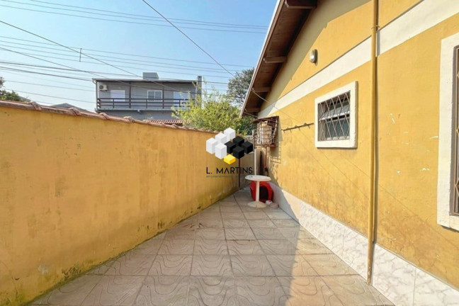 Imagem Casa com 2 Quartos à Venda, 101 m² em Vila Nova - Porto Alegre